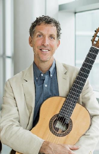 Joseph Pecoraro with guitar